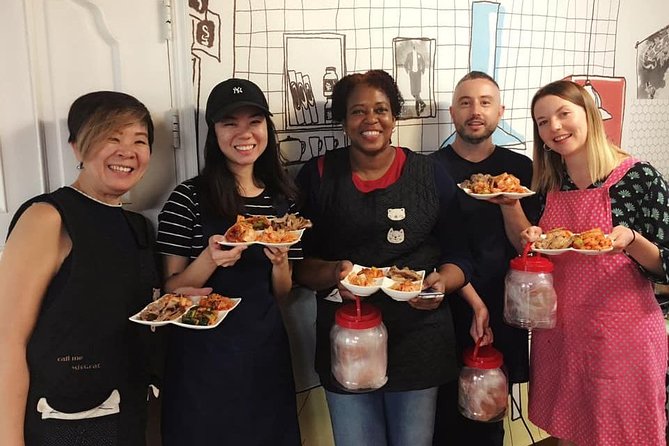 Korean Kimchi Making Day Experience with a Local Market Tour - Market snacks and a real meal: eating kimchi the Korean home way