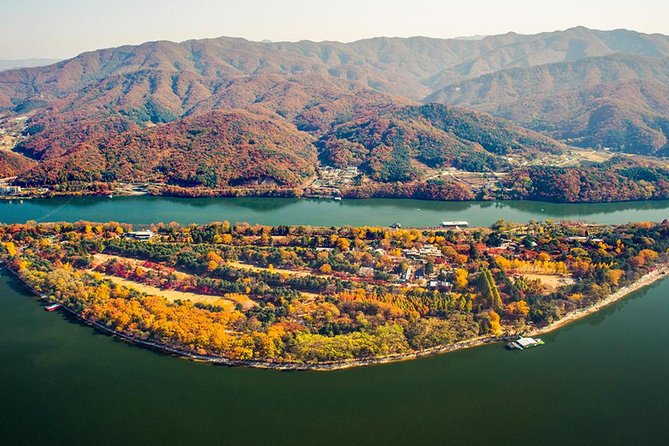 Nami Island & Garden of Morning Calm & Gangchon Railbike Tour - Stop 3: Gangchon Rail Park rail bike—tunnels, four-seat cars, and cold-weather fun