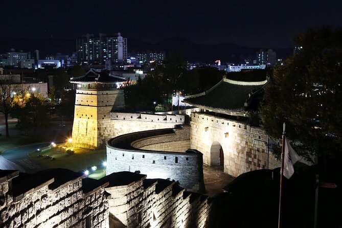 Night View Tour to Suwon Hwaseong Fortress from Seoul - Haenggung-dong at night: walking off the fortress glow