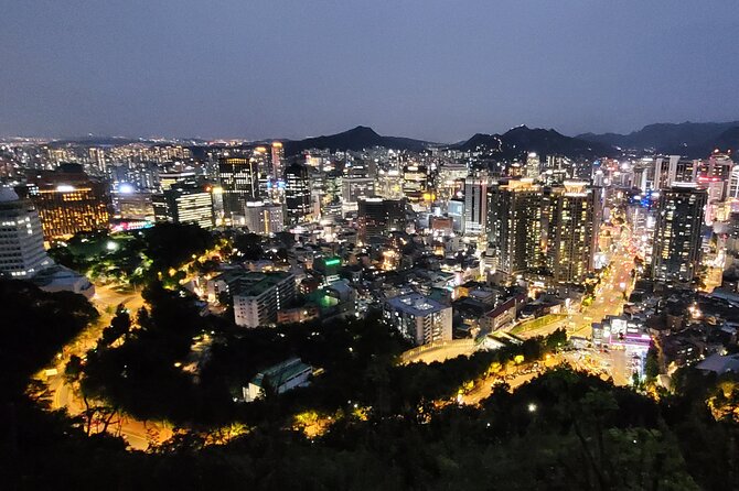 Seoul Food n Night view with Local Korean BBQ dinner Hongdae st. - Gwanghwamun Square after dark: start where Seoul centers itself