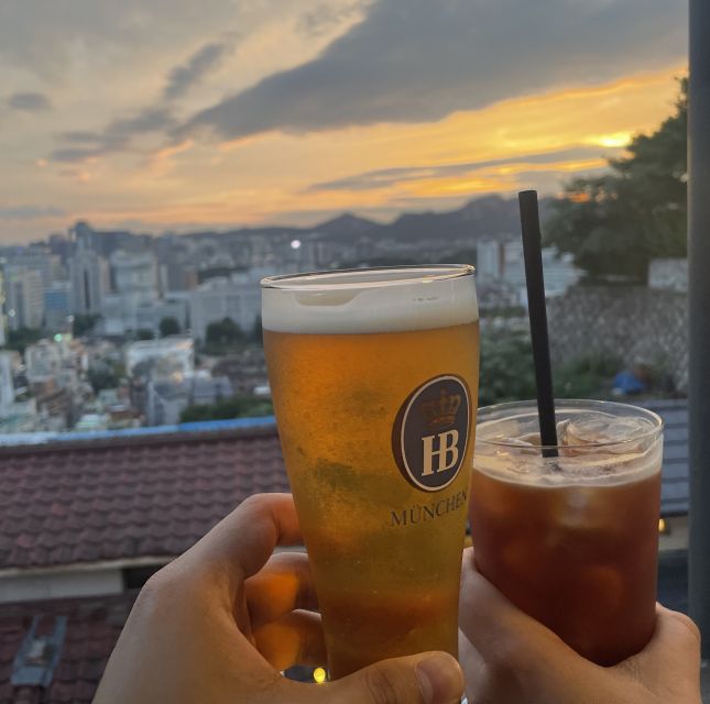 Seoul: Guided City Wall Sunset Hike with Korean Dinner - Café Terrace Break: Your Complimentary Drink and Best Photos