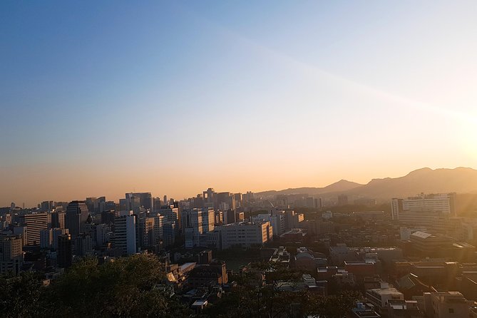 Seoul: Gyeongbok Palace, Bukchon Village, and Gwangjang Tour - Bukchon Hanok Village: quick hanok views and easy photo time