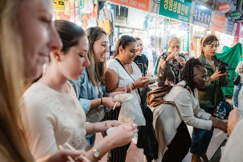 Seoul: Night Market Food Tour with Local Guide - Drinking games and Korean etiquette: how the fun works