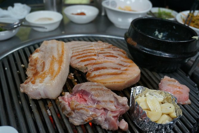 Seoul Night "Private Tour"(Korean BBQ, N-Tower, Seoul Fortress, Local Market) - Stop 5: Cheonggyecheon Stream for an Easy Night Walk